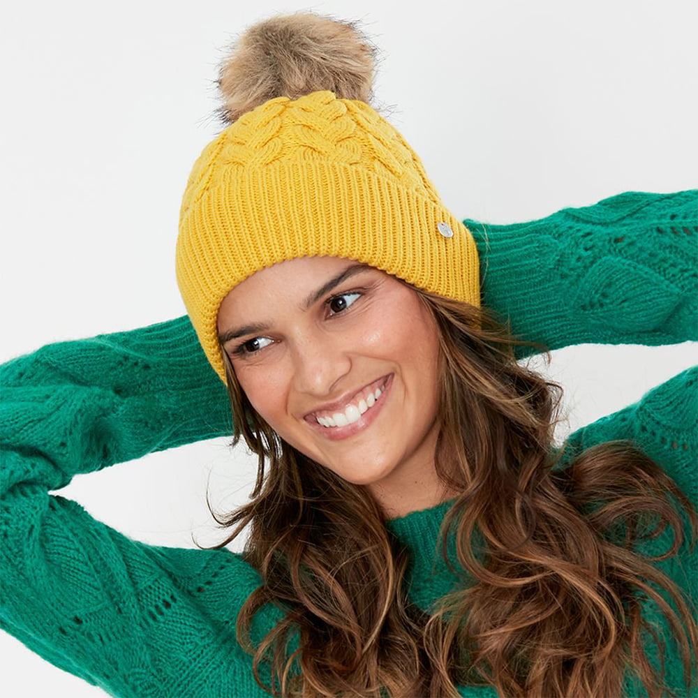 Joules Elena Cable Knit und Kunstfell Bommel Bommelmütze - Senfgelb